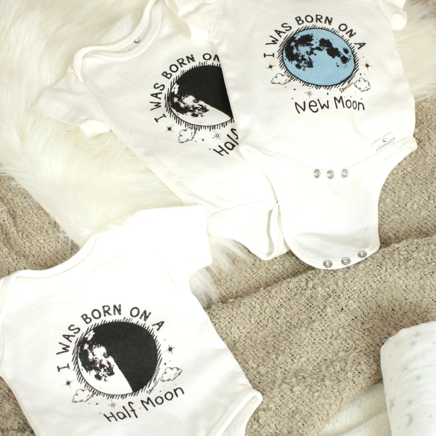 The Birth Moon Sleepy Baby Onesie