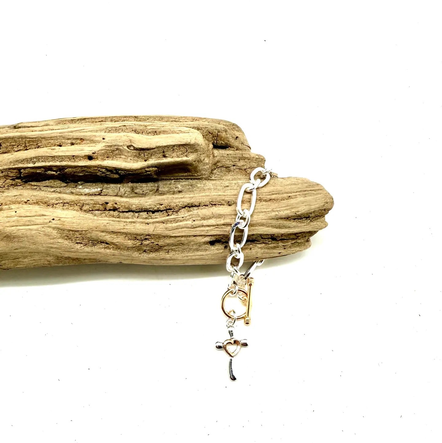 Bracelet Alloy Plated  Sil. Chain W/Multi Metal Cross/Toggle