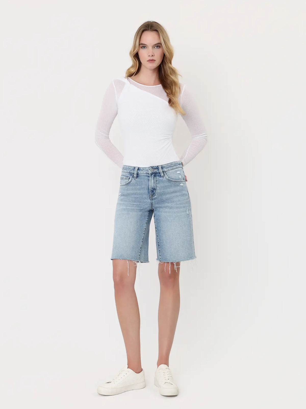 Mid Rise Raw Hem Light Wash Denim Jort